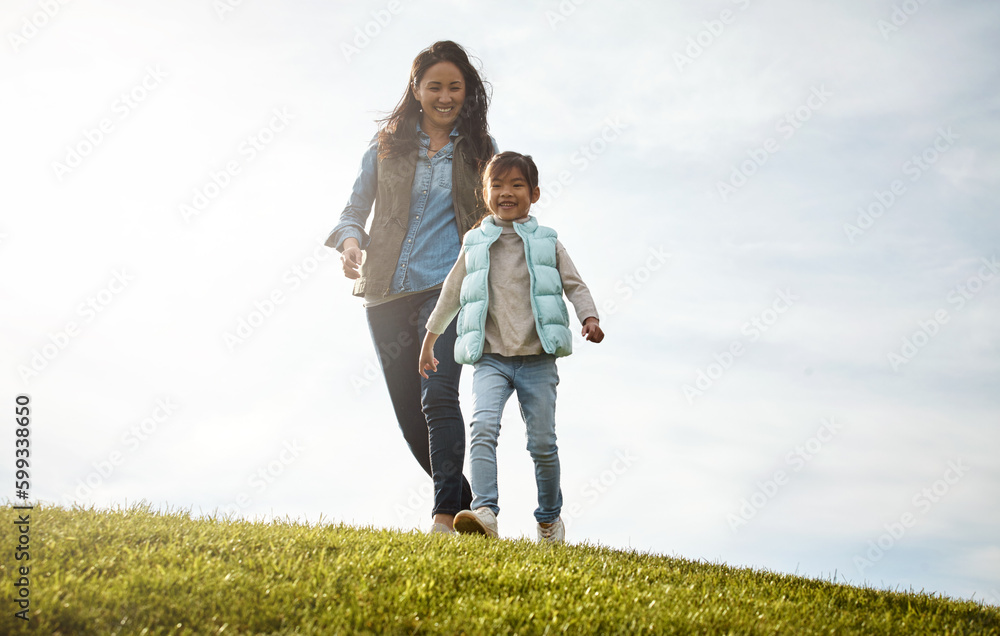 Theres no stopping the fun now. an attractive young woman and her daughter in the park.