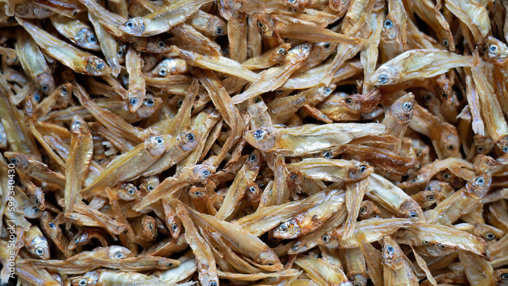 Top view of abundance small dried fish, sunny dried fish in local market Thailand, pattern, texture, seafood, food background, wallpaper