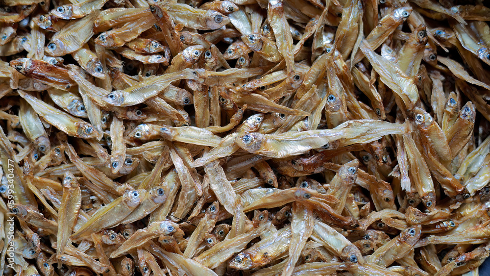 Top view of abundance small dried fish, sunny dried fish in local market Thailand, pattern, texture, seafood, food background, wallpaper