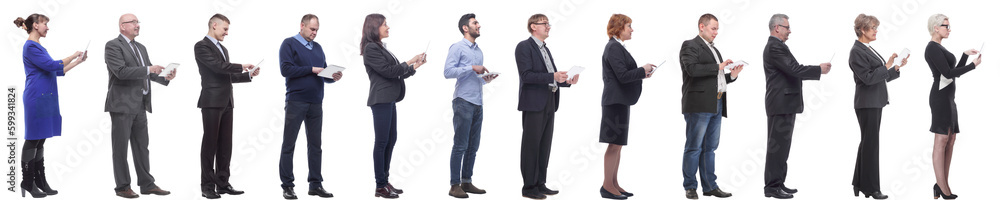 group of people holding tablet and looking ahead group of people holding tablet and looking ahead