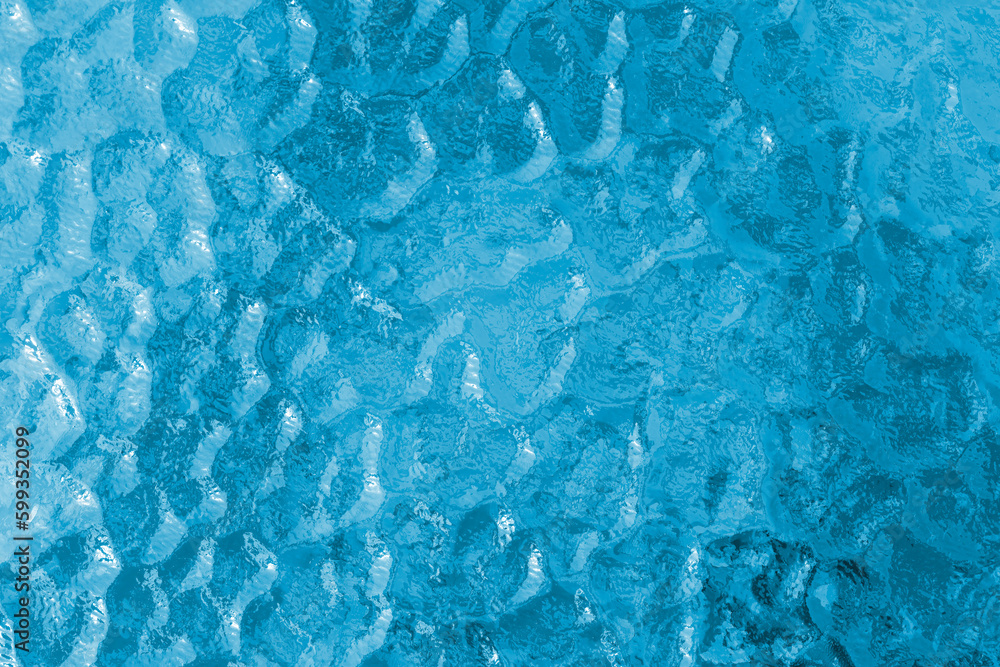 Fototapeta premium Blue rippled reflective surface