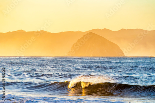 Sunset over the beach, waves, rocks, sunset