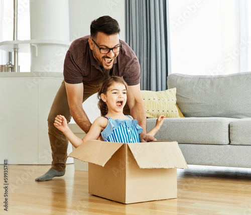 child family father fun happy girl happiness daughter box together relocation moving cardboard box