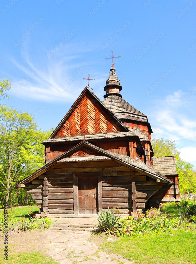 Church of St. Nicholas from the village of Zelenoe (Podolia) in skansen Pirogovo in spring time in Kyiv, Ukraine	

