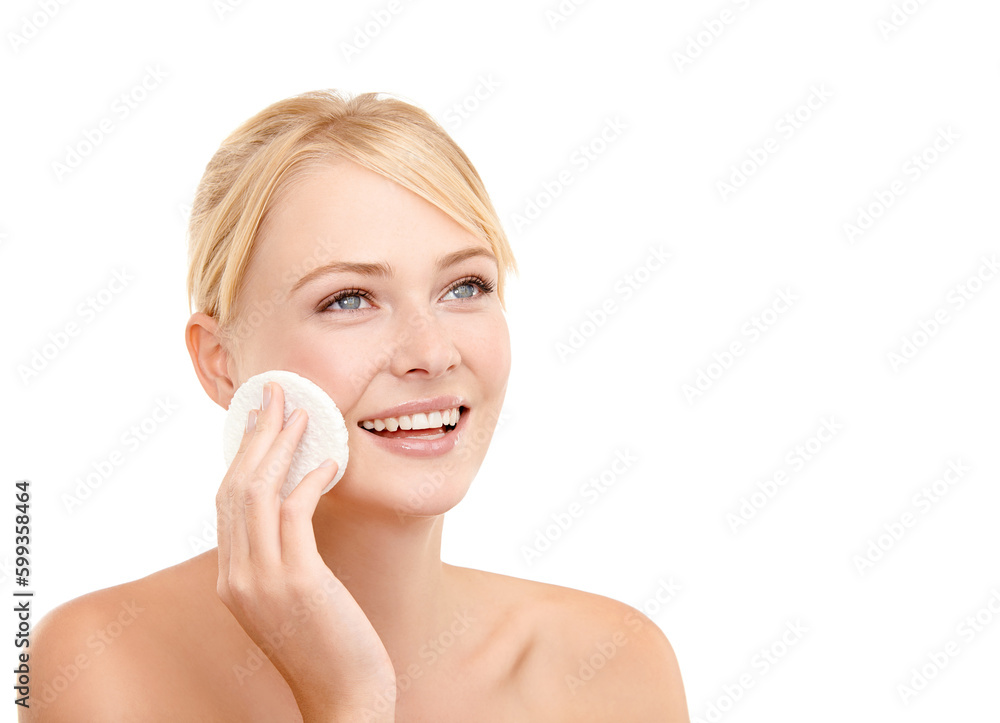 Her face is close to perfection. Studio shot of a young woman applying foundation to her face. Her face is close to perfection. Studio shot of a young woman applying foundation to her face.
