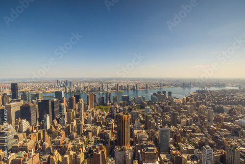 Panoramic view till down with of Empire State Building on skyscrapers buildings Manhattan. New York, USA. © Alex