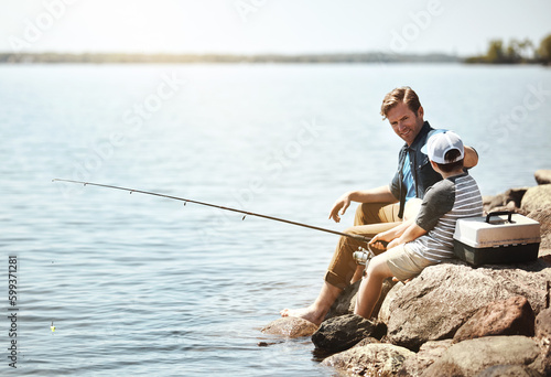 And now we wait for a bite...a father and his little son fishing together.
