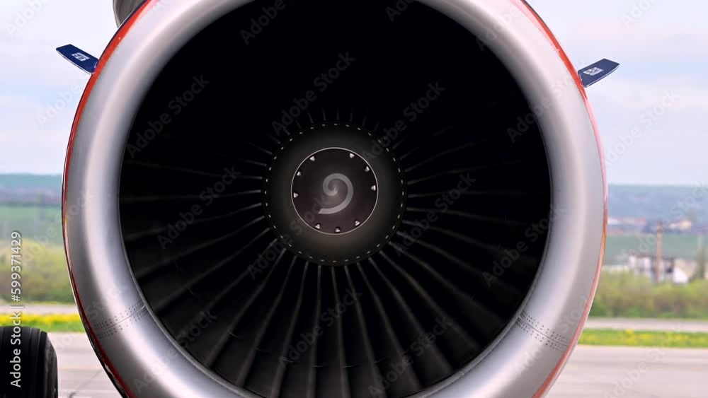 Huge airplane jet engine close up view moving forward heat haze distant airplane lining up behind. 4k super slow motion raw video 120 fps Huge airplane jet engine close up view moving forward heat haze distant airplane lining up behind. 4k super slow motion raw video 120 fps
