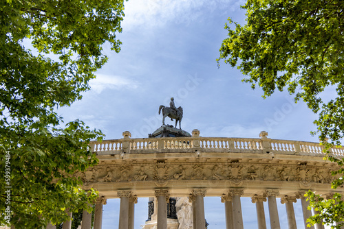 The monument in the retiro park in Madrid on a warm and sunny day