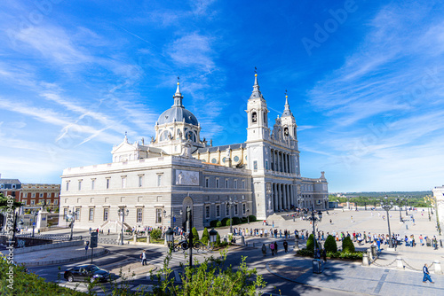 The Museo de la catedral de la almudena in Madrid on a sunny day with a blue sky and some clouds