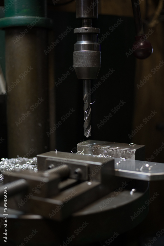 Part machining with drilling machine Part machining with drilling machine