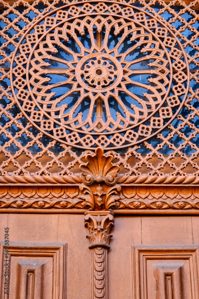 Antique door elaborate decoration, Porto, Portugal.