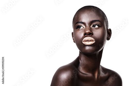 Her beauty is all natural. Studio shot of a beautiful young african woman isolated on white.