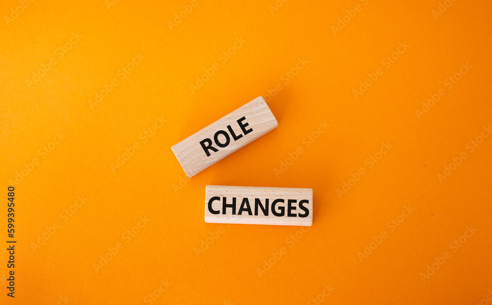 Role changes symbol. Concept words Role changes on wooden blocks. Beautiful orange background. Business and Role changes concept. Copy space. Role changes symbol. Concept words Role changes on wooden blocks. Beautiful orange background. Business and Role changes concept. Copy space.