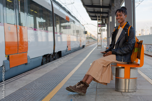 African girl train station