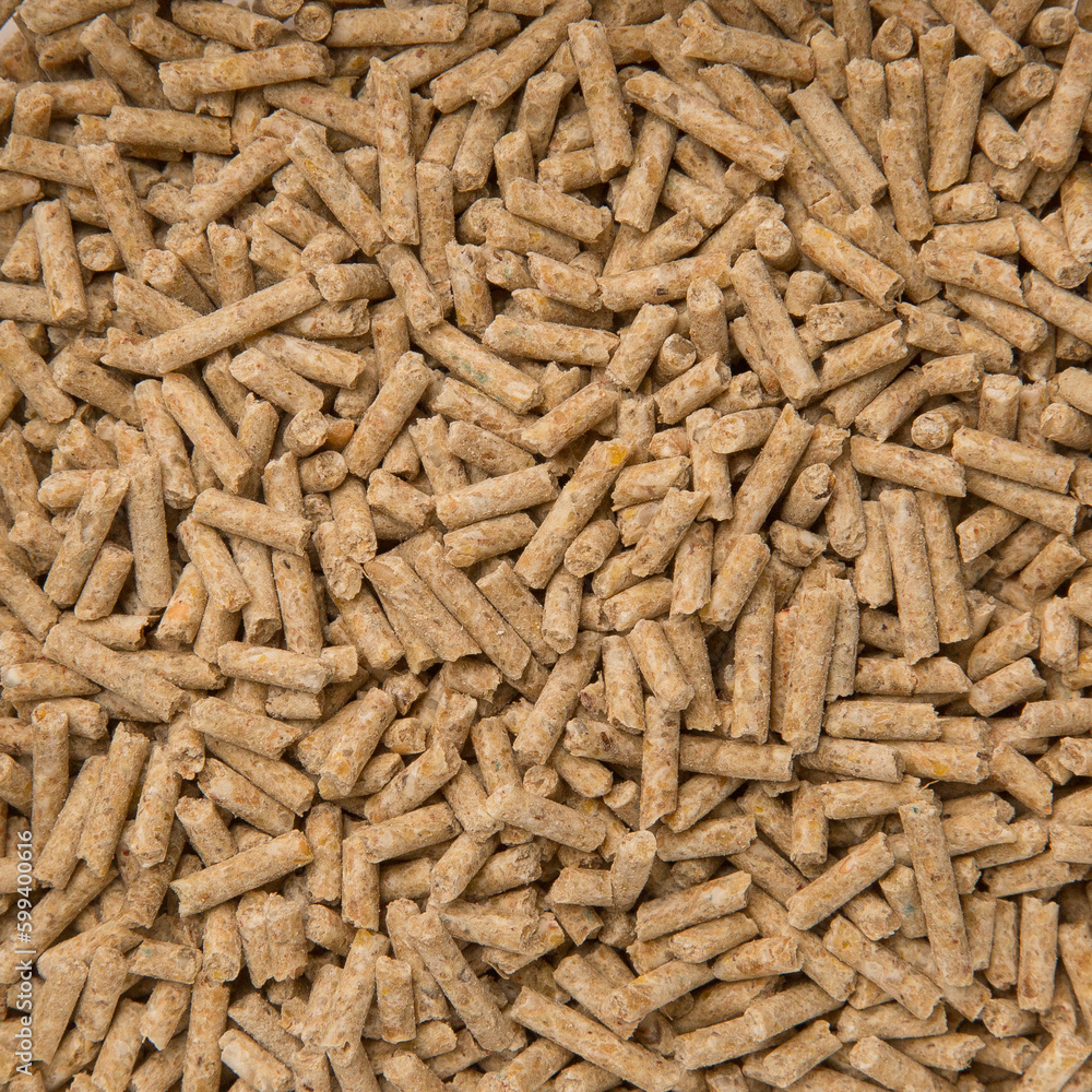 Close-Up Looped Rotation of Long Big Brown Wooden Sawdust Pellets - Natural Cat Litter Filler or Organic Fuel Close-Up Looped Rotation of Long Big Brown Wooden Sawdust Pellets - Natural Cat Litter Filler or Organic Fuel