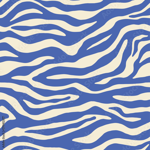 Blue zebra monochrome seamless pattern. Contemporary vector animal skin print. Fashion stylish organic texture. Modern trend design background. Boho style. Hand drawn. Beige background.