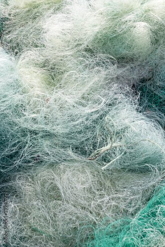 Background of Used fishing net. Fishing industry waste