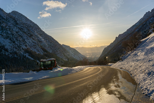 Snow plow along side of highway on the drive up Little Cottonwood Canyon in Utah