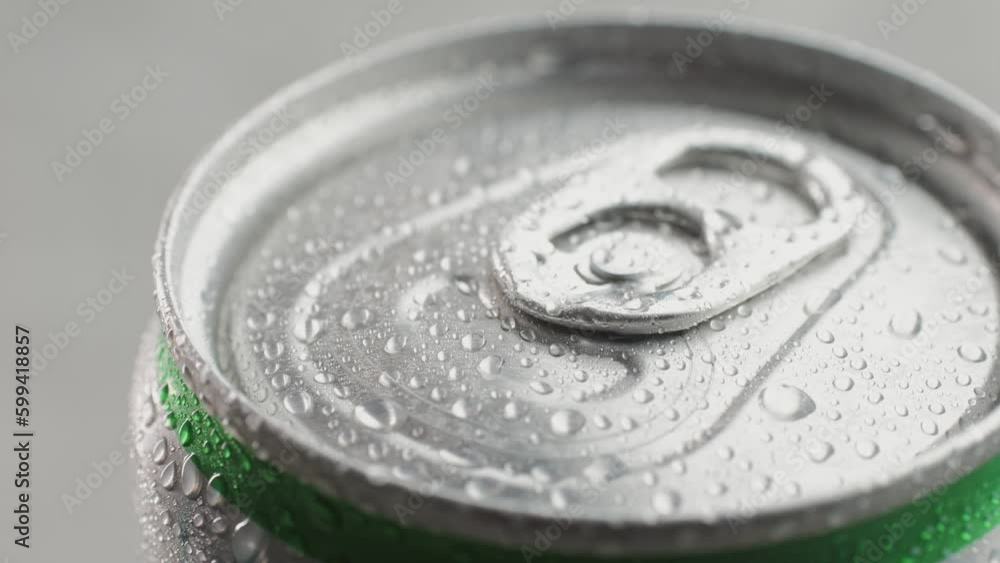 Opening soda or beer can, macro close up of can pull tab opening, watering refreshment, hand open lemonade or juice. Opening soda or beer can, macro close up of can pull tab opening, watering refreshment, hand open lemonade or juice.