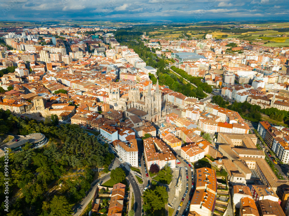 Picturesque aerial view of summer Burgos cityscape overlooking Gothic steeples of Cathedral of Saint Mary, Spain