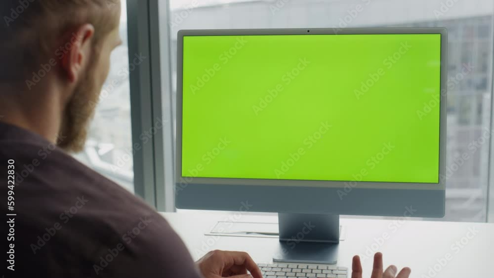 Man videocalling chromakey computer at office. Unknown specialist video call Man videocalling chromakey computer at office. Unknown specialist video call