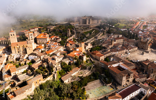 Drone photo of hazy Trujillo with view of Plaza Mayor, Extremadura, Province of Caceres, Spain.