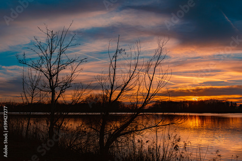 Sunset with reflections near Plattling  Isar  Bavaria  Germany