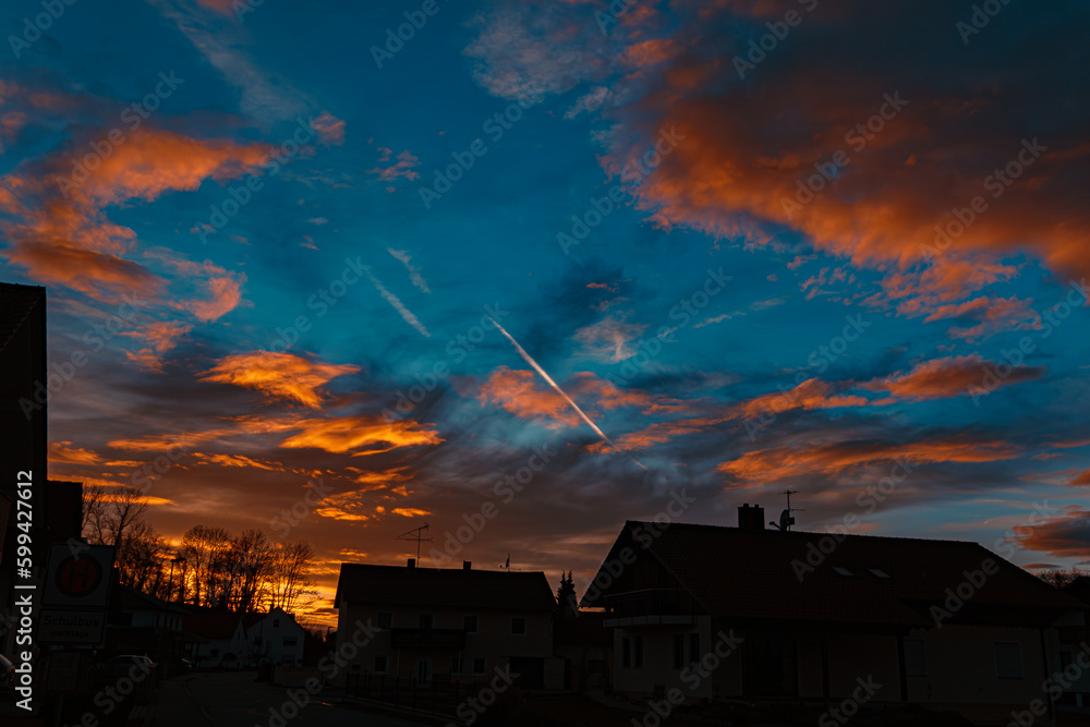 Sunset with dramatic clouds at Tabertshausen, Bavaria, Germany