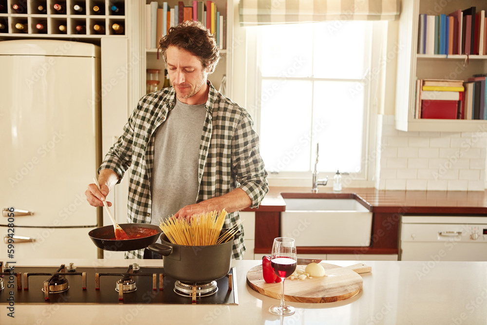 See what happens when you watch cooking shows all day. a man cooking in his kitchen. See what happens when you watch cooking shows all day. a man cooking in his kitchen.