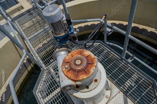 Agitator of sludge clarifier with motor that had rusty. The photo is suitable to use for animal background and content media.