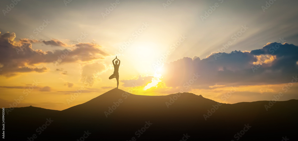 Silhouette of woman practicing yoga under beautiful sky at sunset, banner design