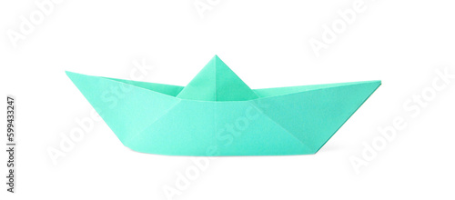 Turquoise paper boat isolated on white. Origami art