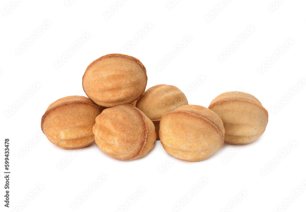Delicious nut shaped cookies with condensed milk on white background Delicious nut shaped cookies with condensed milk on white background