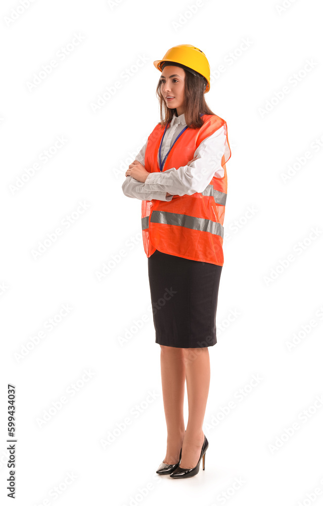 Female worker in vest and hardhat on white background Female worker in vest and hardhat on white background
