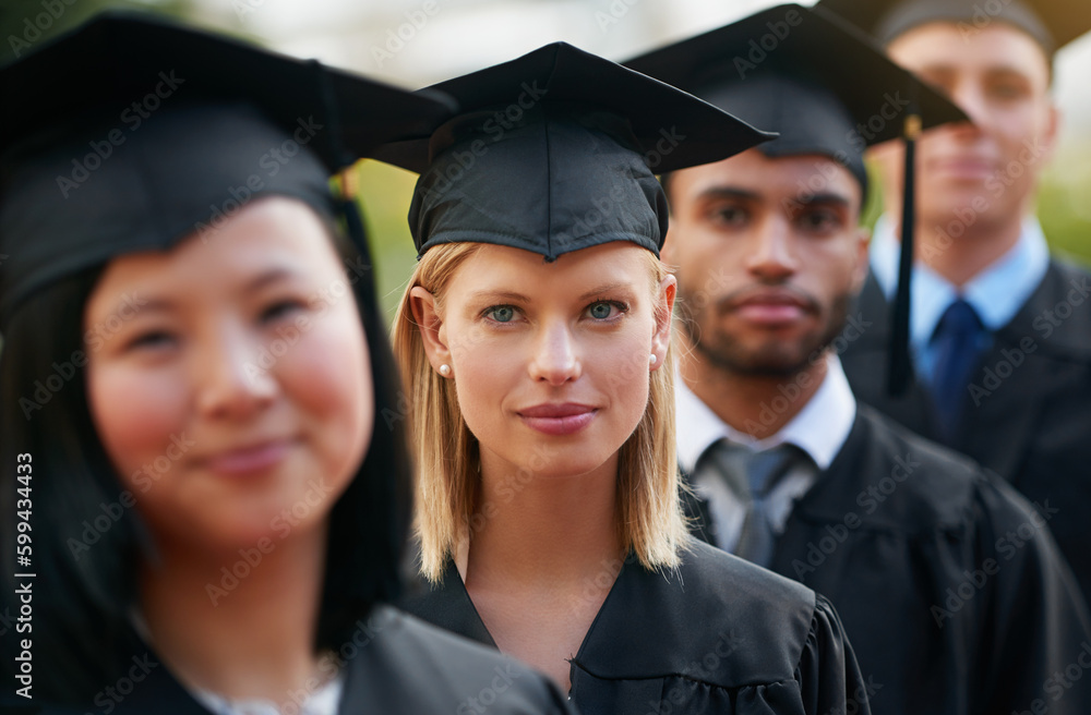 She believed she could, so she did. a group of young college graduates standing in a row. She believed she could, so she did. a group of young college graduates standing in a row.