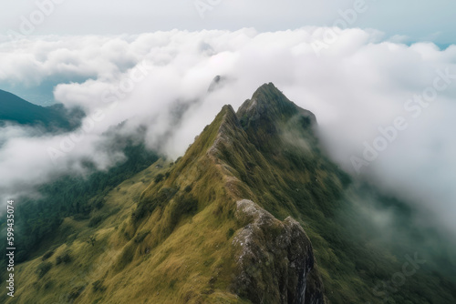 Enchanting misty mountain peak standing tall amidst the cloud cover, offering a bird's eye view of the valley below, generative ai