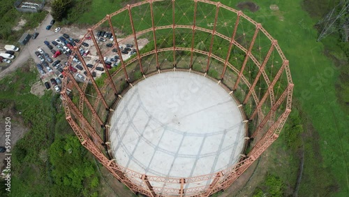 Disused gas holder East Ham London UK overhead birds eye view