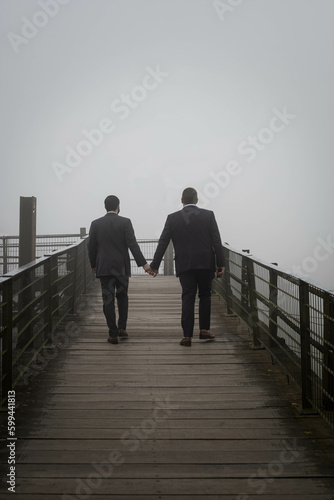 men couple on a bridge 