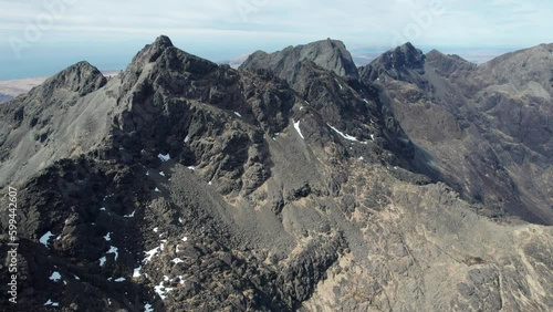 Drone panning shot of the high Sgurr Alasdair at Isle of Skye in Scotland photo