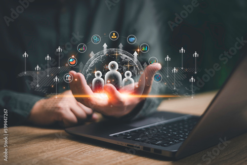 Fototapeta Naklejka Na Ścianę i Meble -  Customer relationship management and business growth concept, Businessman use a laptop with global structure customer network business development and online digital marketing