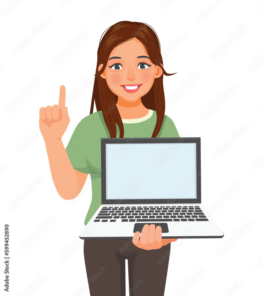 Young woman holding laptop with empty screen pointing finger for copy space Young woman holding laptop with empty screen pointing finger for copy space