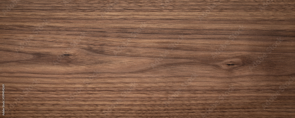 Naklejka premium Natural walnut grain with beautiful wood grain. Walnut long planks texture. Walnut wood texture background.