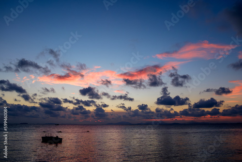 Late Evening Sunset on Thai Beach with light shine through the clouds. no tide