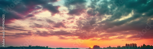 Attractive colorful sunset with cloudy sky in rural area. Scenic image of textured sky. Perfect summertime wallpaper. Bright epic sky. Discover the beauty of earth.