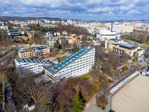 Obraz na płótnie Aerial view landscape Poland Gdynia. View of buildings, trees, sky with clouds. w salonie