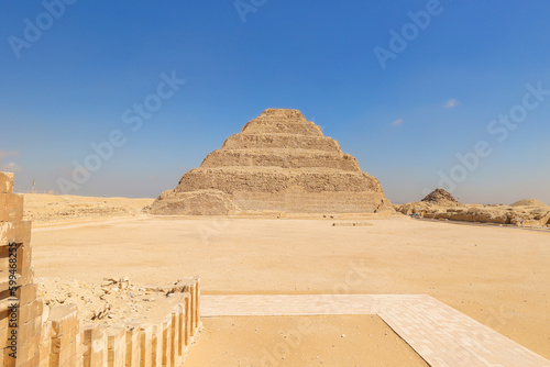 Step Pyramid of Saqqara, the oldest surviving large stone building in the world, in Giza, Egypt. Pharaoh Djoser circa 2650 BC.