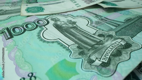 One thousand russian rubble in macro shot. Crimea bridge with ship and seagull as symbol. Gas payment in russian currency. War russia against ukrain concept.