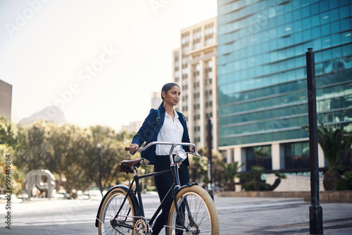 Transport, walking and businesswoman with a bicycle in the city, morning and street for work routine. Eco friendly, travel and professional female employee commuting to office with bike in urban town