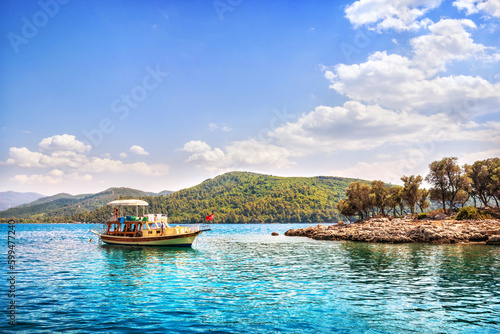 Pleasure ship in the bay, Sedir island, Aegean sea, Marmaris, Turkey © yulenochekk